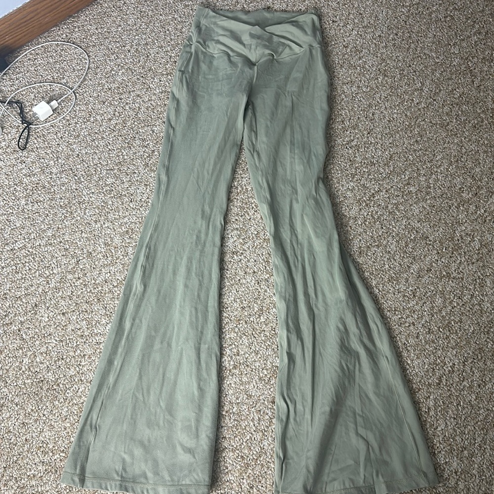 Sage green flare leggings.